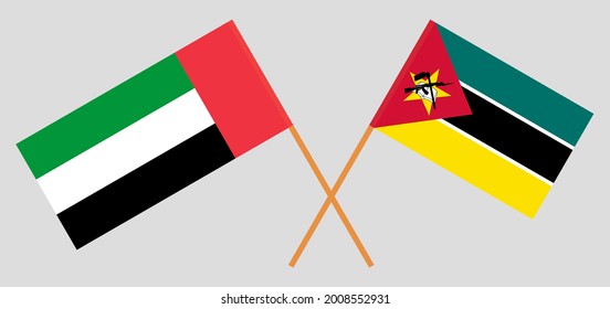 Crossed flags of the United Arab Emirates and Mozambique. Official colors. Correct proportion