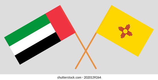 Crossed flags of the United Arab Emirates and the State of New Mexico. Official colors. Correct proportion