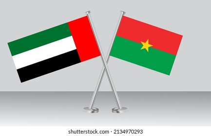 Gekreuzte Flaggen der Vereinigten Arabischen Emirate (VAE) und Burkina Faso. Offizielle Farben. Richtiger Anteil. Banner-Design