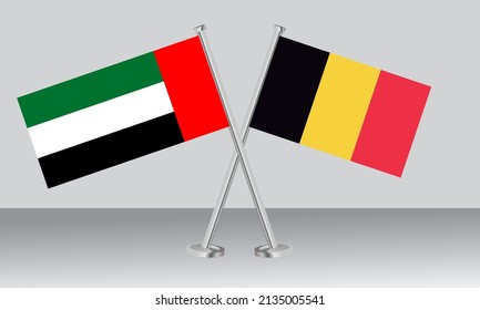 Crossed flags of United Arab Emirates (UAE) and Belgium. Official colors. Correct proportion. Banner design