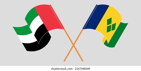 Crossed flags of the United Arab Emirates and Saint Vincent and the Grenadines. Official colors. Correct proportion. Vector illustration
