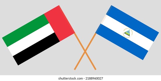 Gekreuzte Flaggen der Vereinigten Arabischen Emirate und Nicaraguas. Offizielle Farben. Richtiger Anteil. Vektorgrafik
