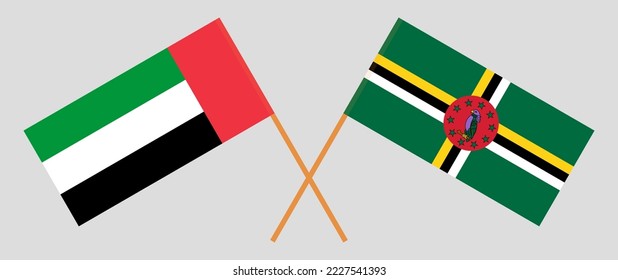 Crossed flags of the United Arab Emirates and Dominica. Official colors. Correct proportion. Vector illustration
