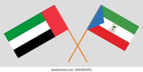 Crossed flags of the United Arab Emirates and Equatorial Guinea. Official colors. Correct proportion. Vector illustration
