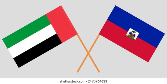 Banderas cruzadas de los Emiratos Árabes Unidos y Haití. Colores oficiales. Proporción correcta. Ilustración vectorial
