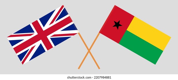 Crossed flags of United Kingdom and Guinea-Bissau. Official colors. Correct proportion. Vector illustration
