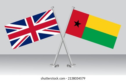 Crossed flags of United Kingdom (UK) and Guinea Bissau. Official colors. Correct proportion. Banner design
