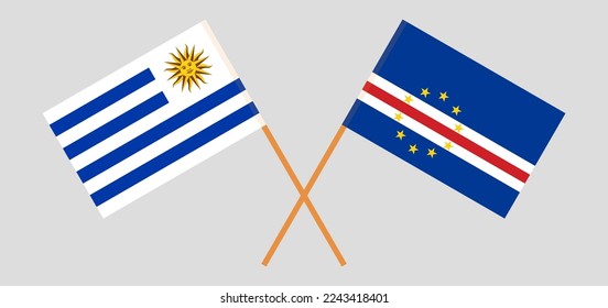 Crossed flags of Uruguay and Cape Verde. Official colors. Correct proportion. Vector illustration
