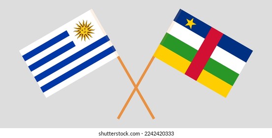 Crossed flags of Uruguay and Central African Republic. Official colors. Correct proportion. Vector illustration
