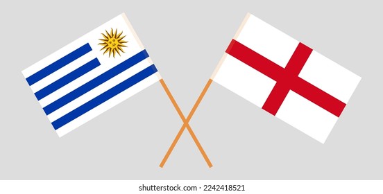 Crossed flags of Uruguay and England. Official colors. Correct proportion. Vector illustration
