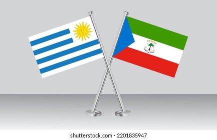Banderas cruzadas de Uruguay y Guinea Ecuatorial. Colores oficiales. Proporción correcta. Diseño de pancartas