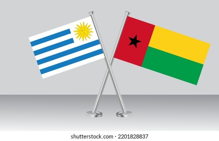 Crossed flags of Uruguay and Guinea Bissau. Official colors. Correct proportion. Banner design
