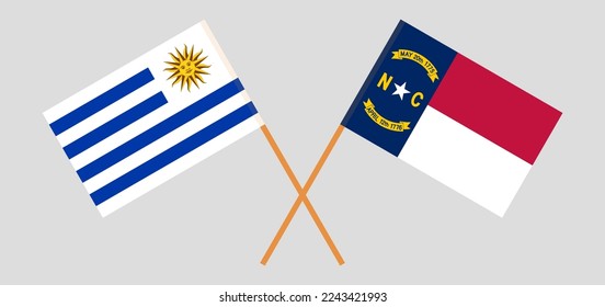 Crossed flags of Uruguay and The State of North Carolina. Official colors. Correct proportion. Vector illustration
