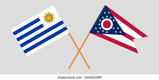 Crossed flags of Uruguay and the State of Ohio. Official colors. Correct proportion. Vector illustration
