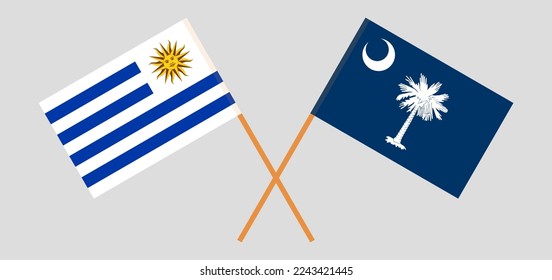 Überquerte Flaggen von Uruguay und dem Staat South Carolina. Offizielle Farben. Richtiger Anteil. Vektorgrafik
