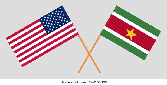 Crossed flags of the USA and Suriname. Official colors. Correct proportion
