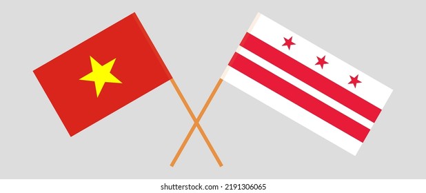 Crossed flags of Vietnam and the District of Columbia. Official colors. Correct proportion. Vector illustration
