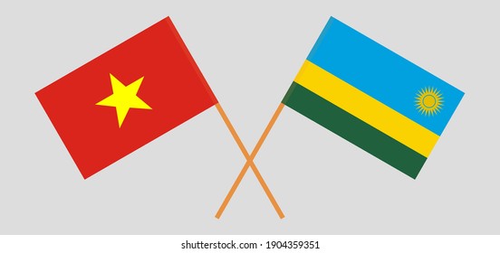 Crossed flags of Vietnam and Rwanda