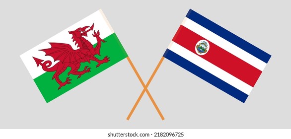 Crossed flags of Wales and Costa Rica. Official colors. Correct proportion. Vector illustration
