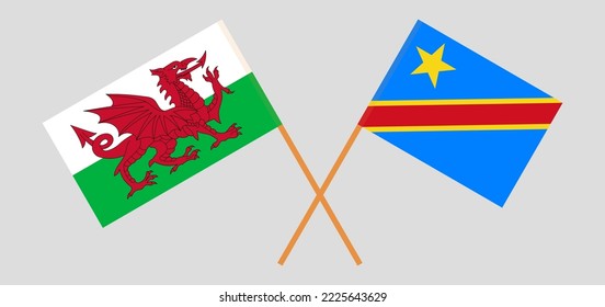 Crossed flags of Wales and Democratic Republic of the Congo. Official colors. Correct proportion. Vector illustration

