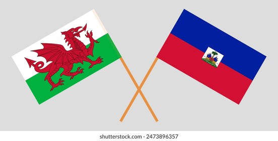 Crossed flags of Wales and Haiti. Official colors. Correct proportion. Vector illustration
