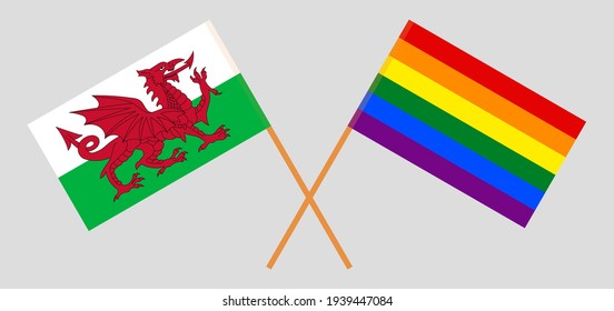 Crossed flags of Wales and LGBTQ. Official colors. Correct proportion