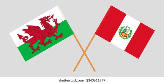 Crossed flags of Wales and Peru. Official colors. Correct proportion. Vector illustration
