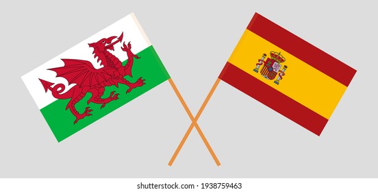 Crossed flags of Wales and Spain. Official colors. Correct proportion