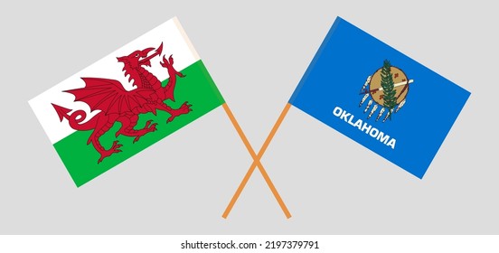 Crossed flags of Wales and The State of Oklahoma. Official colors. Correct proportion. Vector illustration
