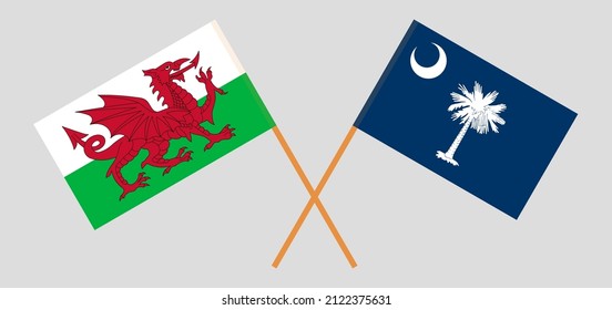 Crossed flags of Wales and The State of South Carolina. Official colors. Correct proportion. Vector illustration
