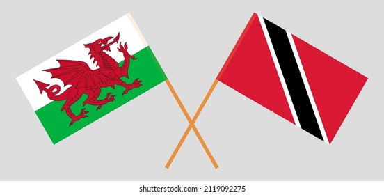 Crossed flags of Wales and Trinidad and Tobago. Official colors. Correct proportion. Vector illustration