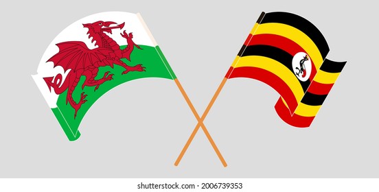 Crossed flags of Wales and Uganda. Official colors. Correct proportion