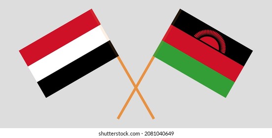 Crossed flags of Yemen and Malawi. Official colors. Correct proportion