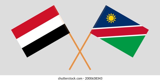 Banderas cruzadas de Yemen y Namibia. Colores oficiales. Proporción correcta