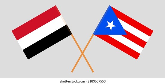 Crossed flags of Yemen and Puerto Rico. Official colors. Correct proportion. Vector illustration
