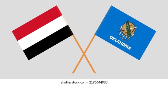 Crossed flags of Yemen and The State of Oklahoma. Official colors. Correct proportion. Vector illustration

