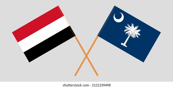 Crossed flags of Yemen and The State of South Carolina. Official colors. Correct proportion. Vector illustration
