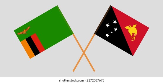 Crossed flags of Zambia and Papua New Guinea. Official colors. Correct proportion. Vector illustration
