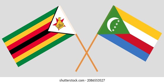 Banderas cruzadas de Zimbabue y las Comoras. Colores oficiales. Proporción correcta. Ilustración del vector
