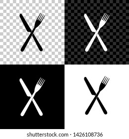 Crossed fork and knife icon isolated on black, white and transparent background. Restaurant icon. Vector Illustration