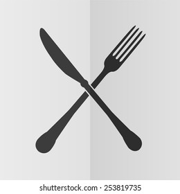 Crossed fork and knife vector icon. Effect of folded paper. Flat design