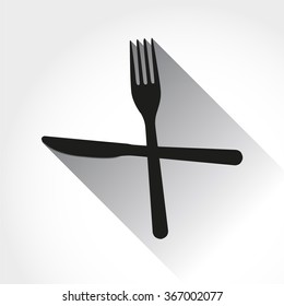 Crossed fork over knife in flat design