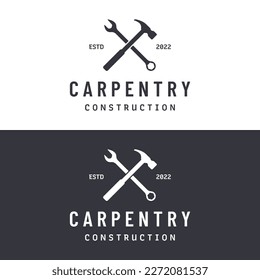 Crossed hammer logo design for vintage work carpentry tools.Logo for handyman, repair, construction.