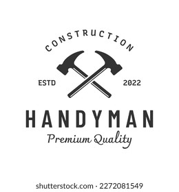 Crossed hammer logo design for vintage work carpentry tools.Logo for handyman, repair, construction.