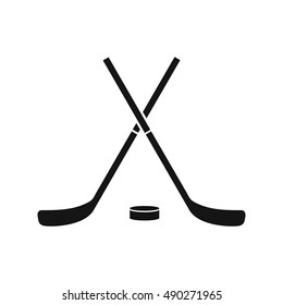 Crossed hockey sticks and puck icon in simple style on a white background vector illustration