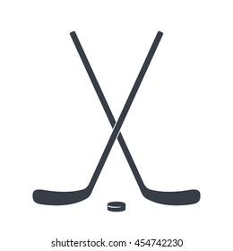 Crossed Ice Hockey sticks isolated on white