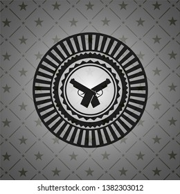 crossed pistols icon inside dark badge