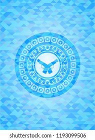 crossed pistols icon inside light blue mosaic emblem