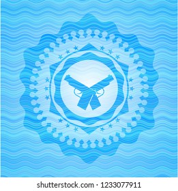 crossed pistols icon inside light blue water wave badge background.