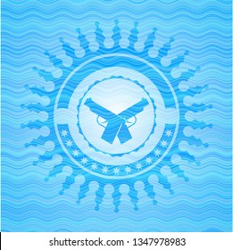 crossed pistols icon inside light blue water emblem background.